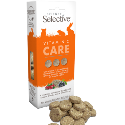 The image shows a package of Science Selective Vitamin C Care, a supplement for rabbits, guinea pigs, and chinchillas. The package is orange with the product name "Vitamin C CARE" in bold letters. The box contains several round supplements, with a few placed in front of the package. The ingredients include Vitamin C, cranberry, and blackcurrant to help promote natural immune defense. The bottom of the package also highlights that it is suitable for rabbits, guinea pigs, and chinchillas, with a net weight of 100g (3.5oz). The Supreme Petfoods logo is visible in the top left corner.
